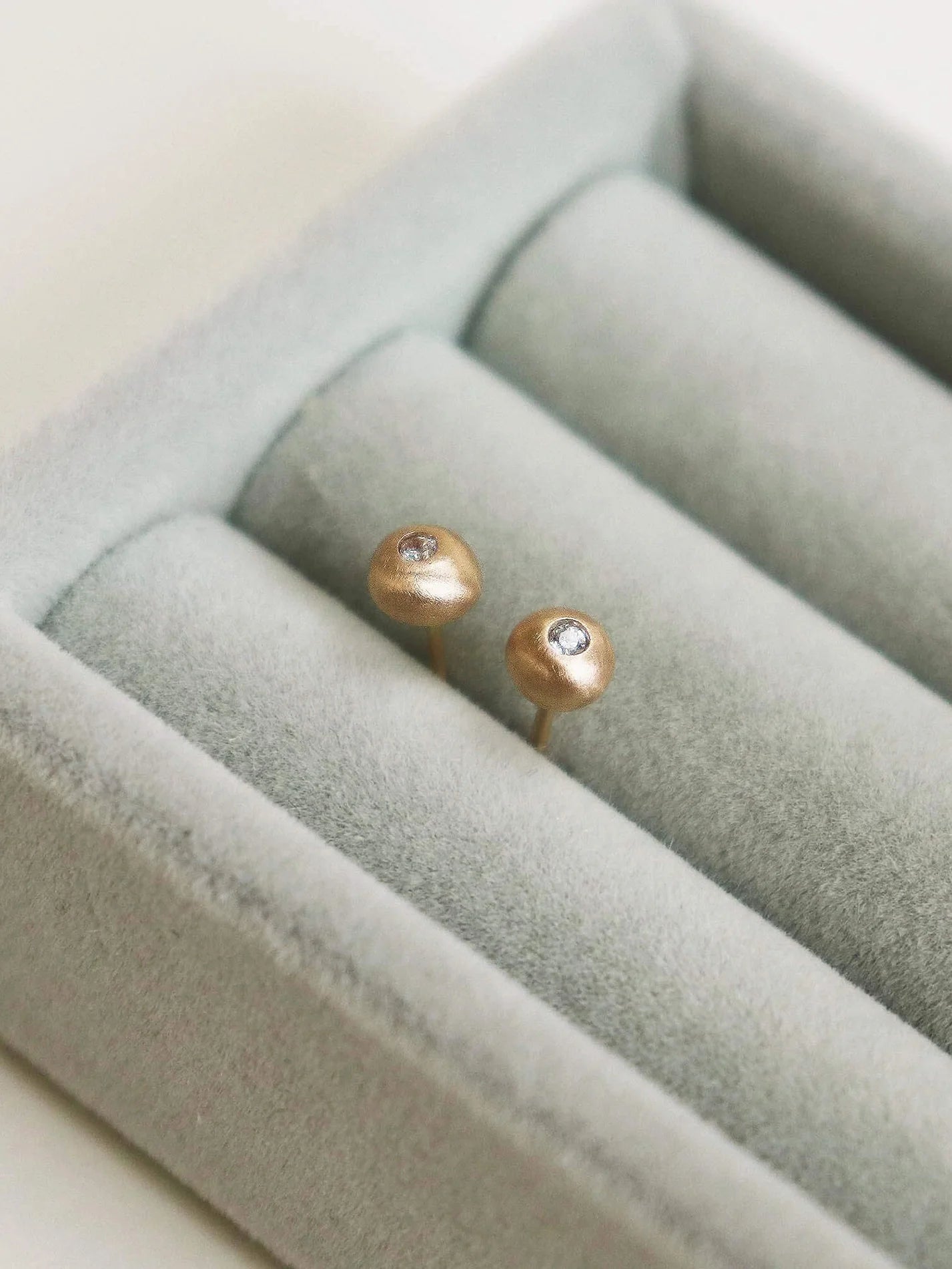 Pebble studs.  Pink champagne sapphire