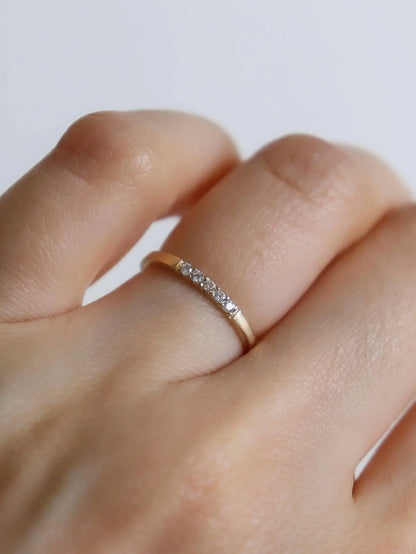 Vanee.  Petite pave diamond ring