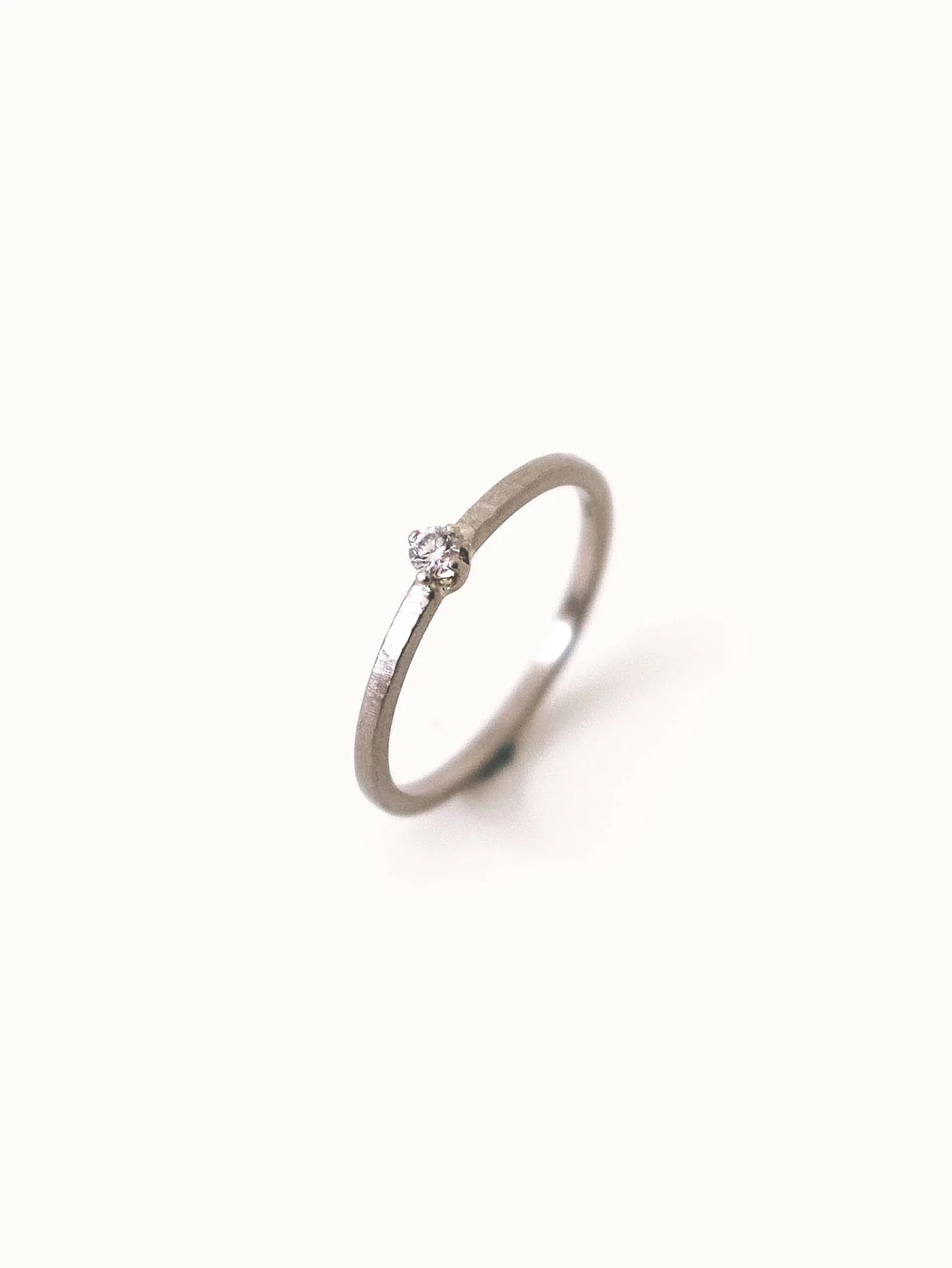 Baby diamond ring. Palladium white gold