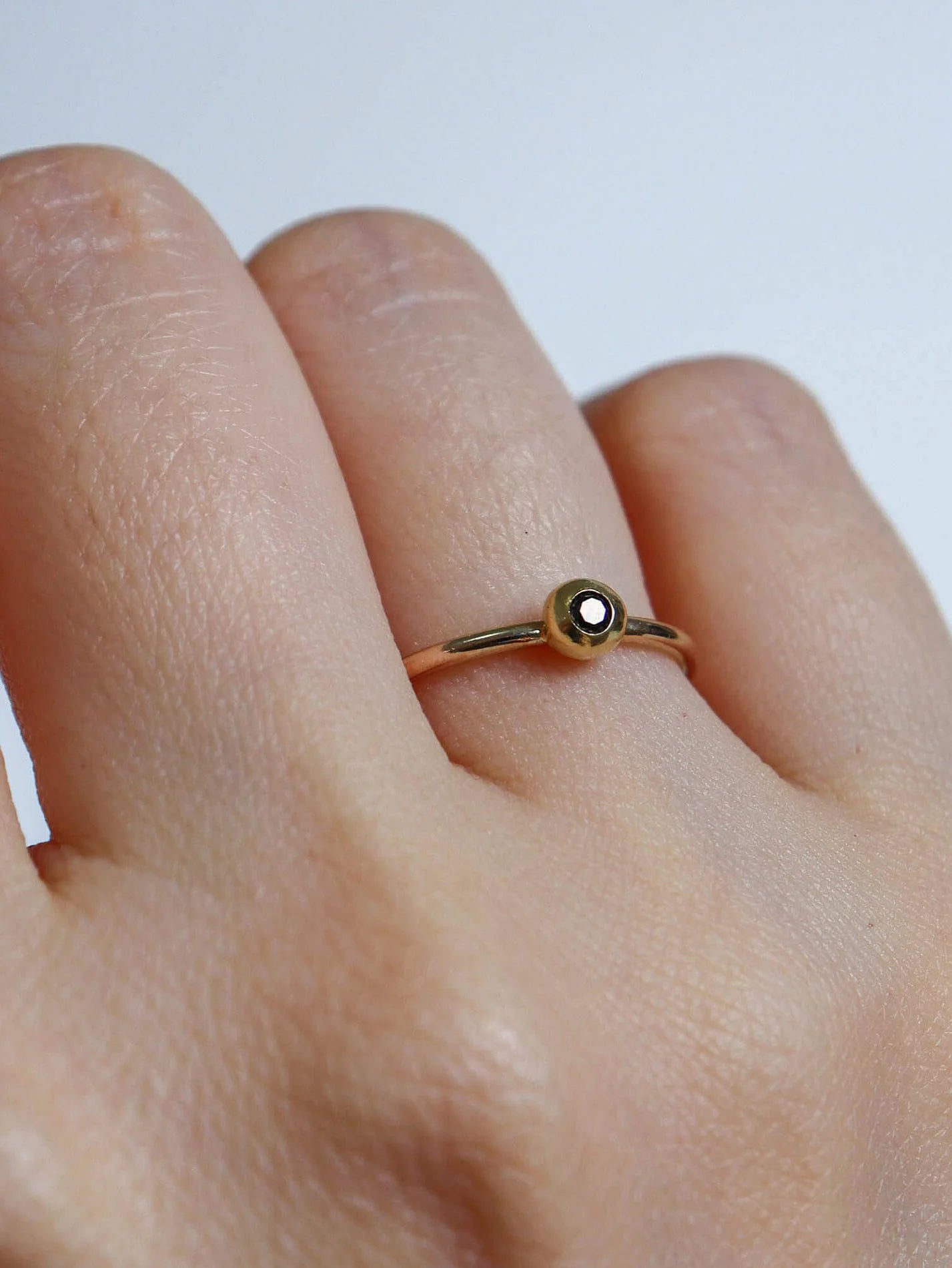 Black diamond pebble ring