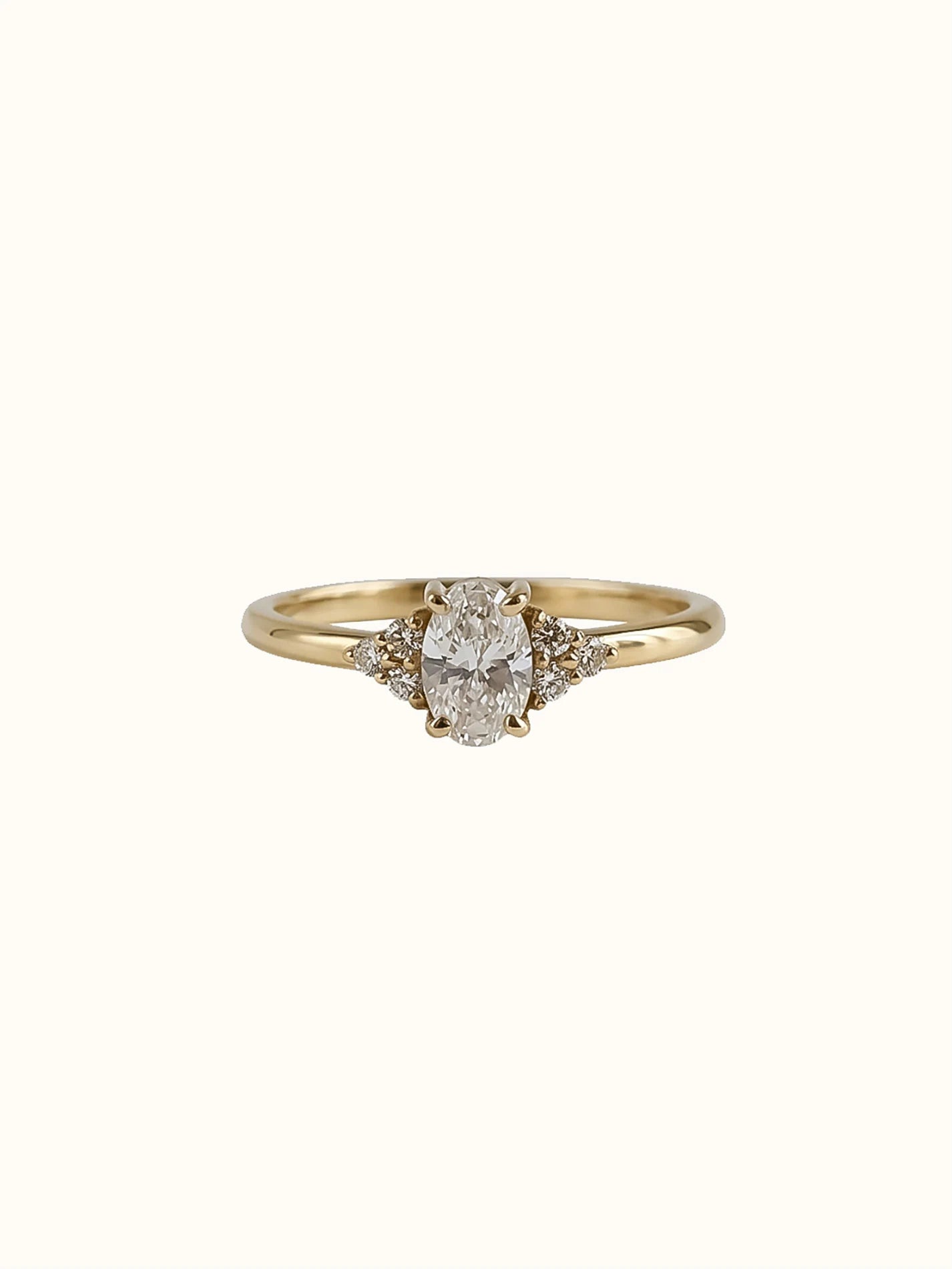Camille. Oval diamond ring with diamond accents