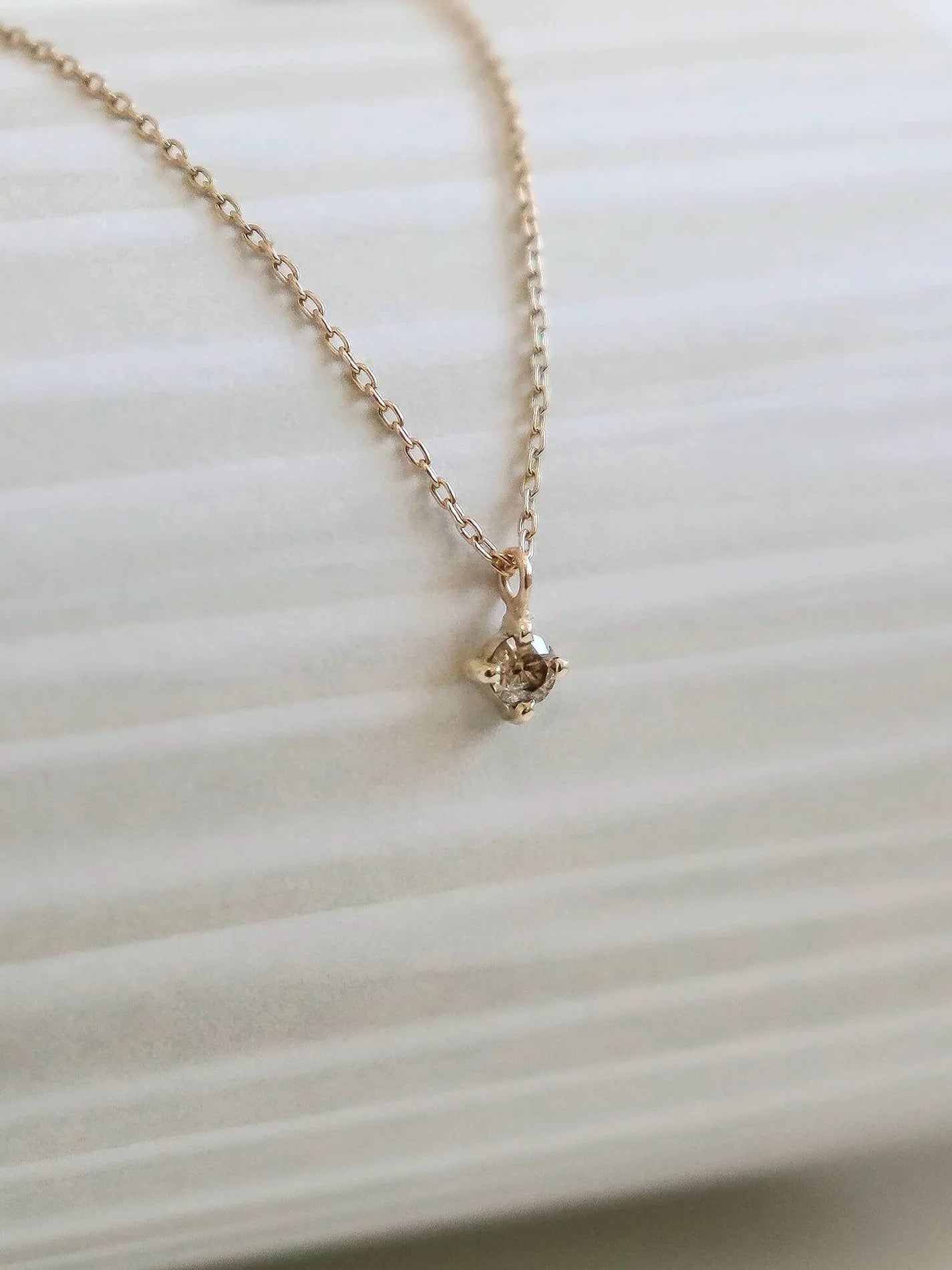 Champagne diamond solitaire