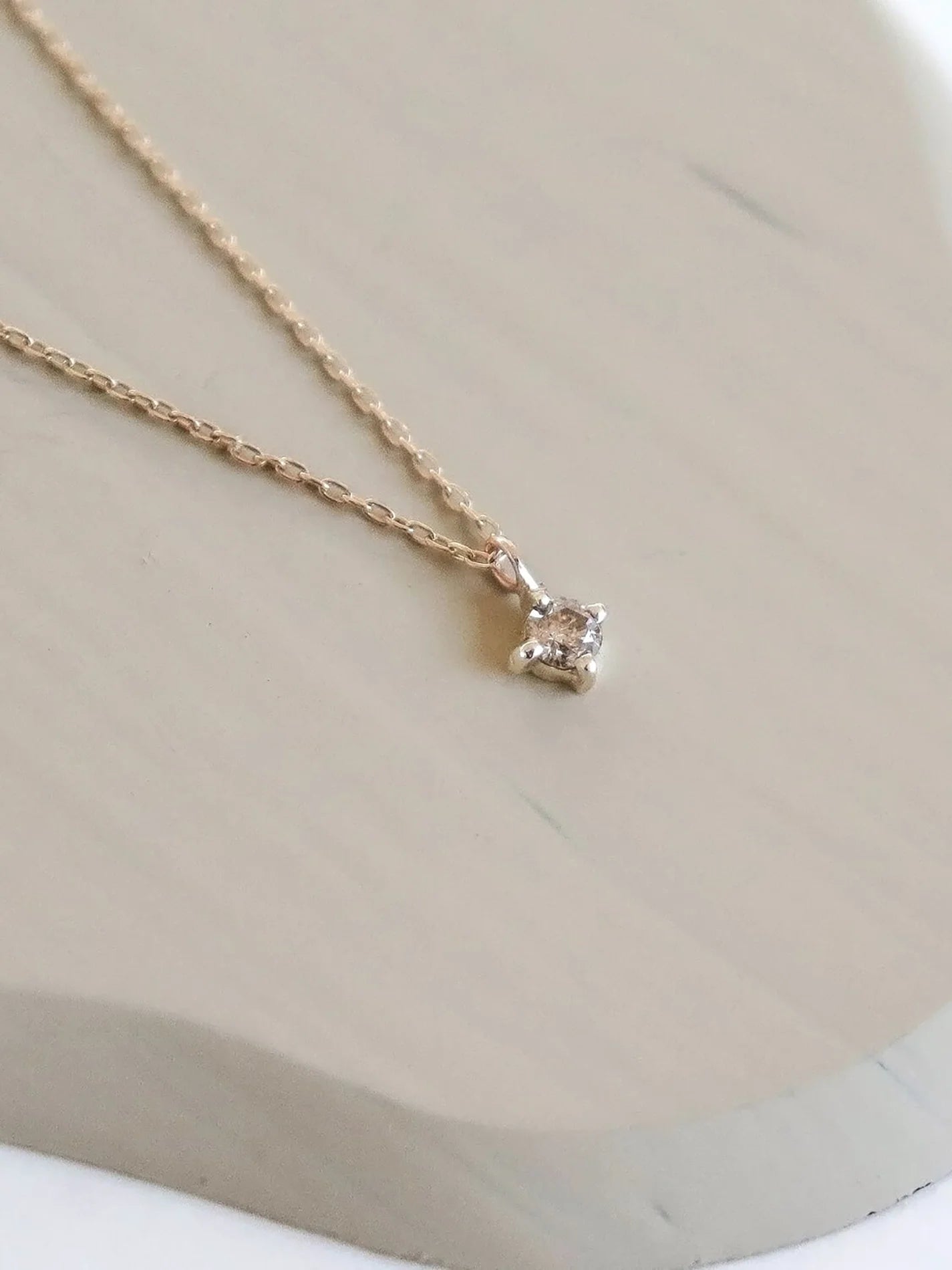 Champagne diamond solitaire