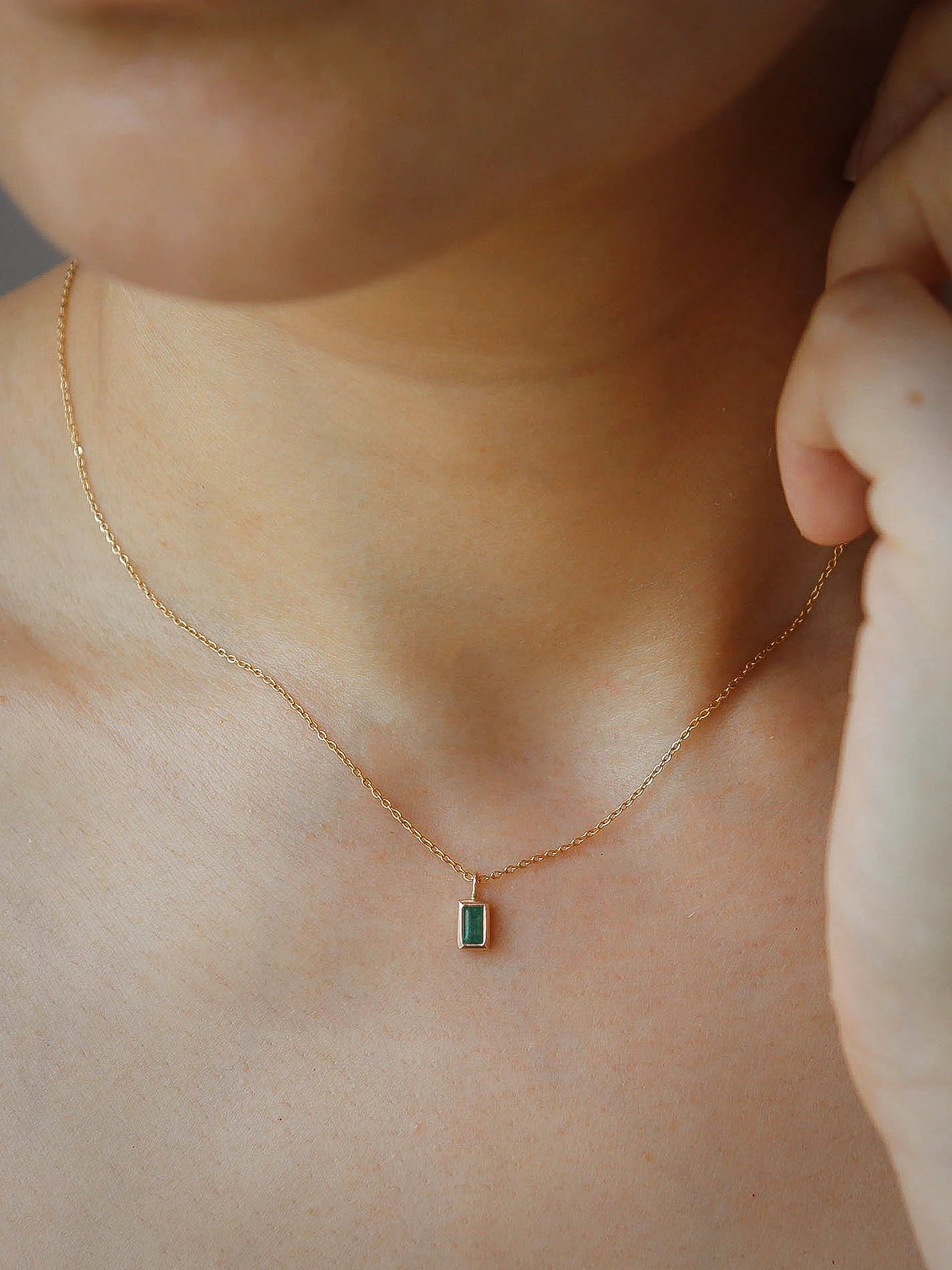 emerald baguette necklace