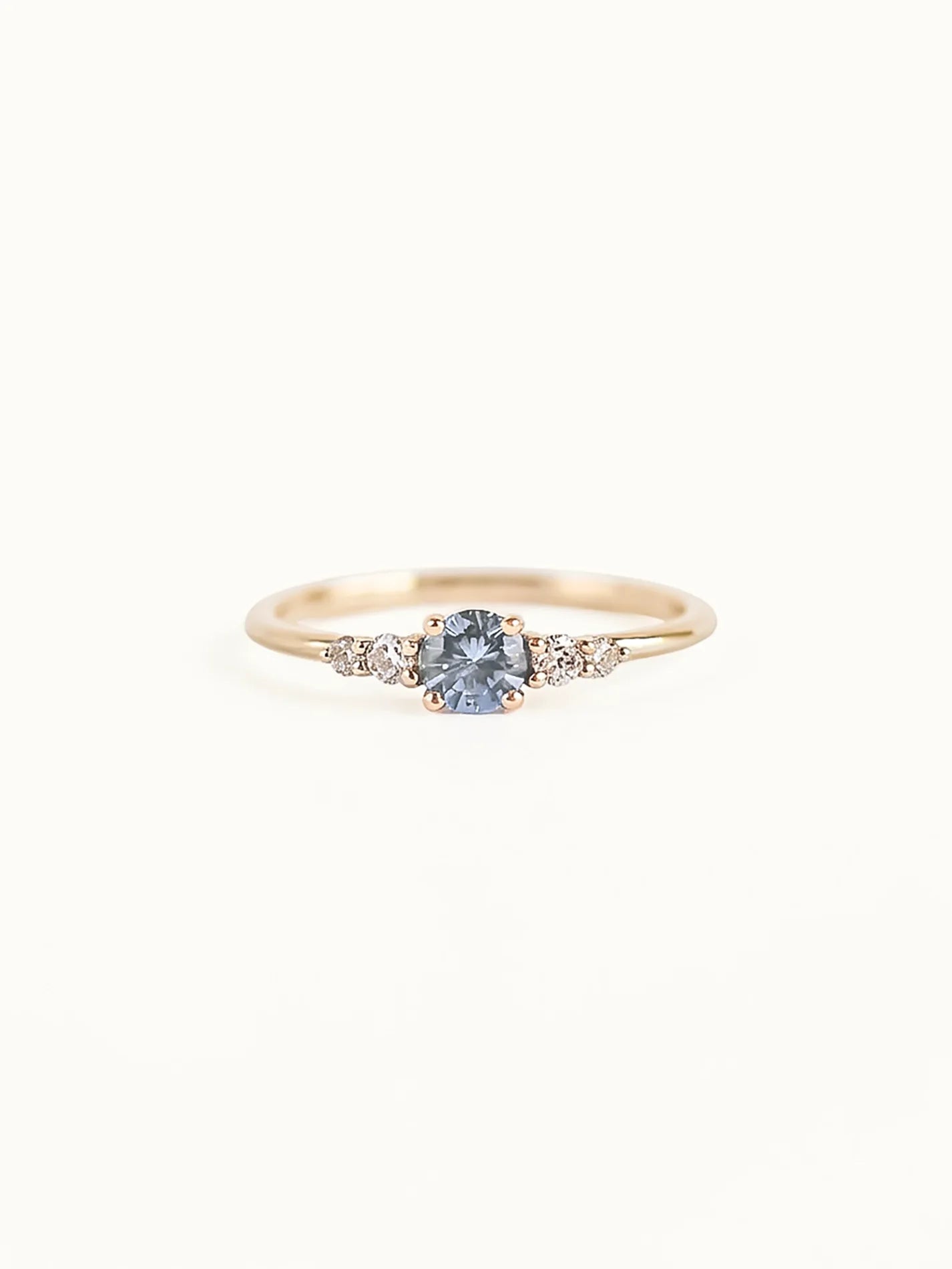 Frost sonnet. Light blue sapphire & diamonds