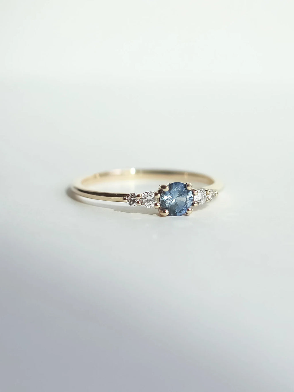 Frost sonnet. Light blue sapphire & diamonds