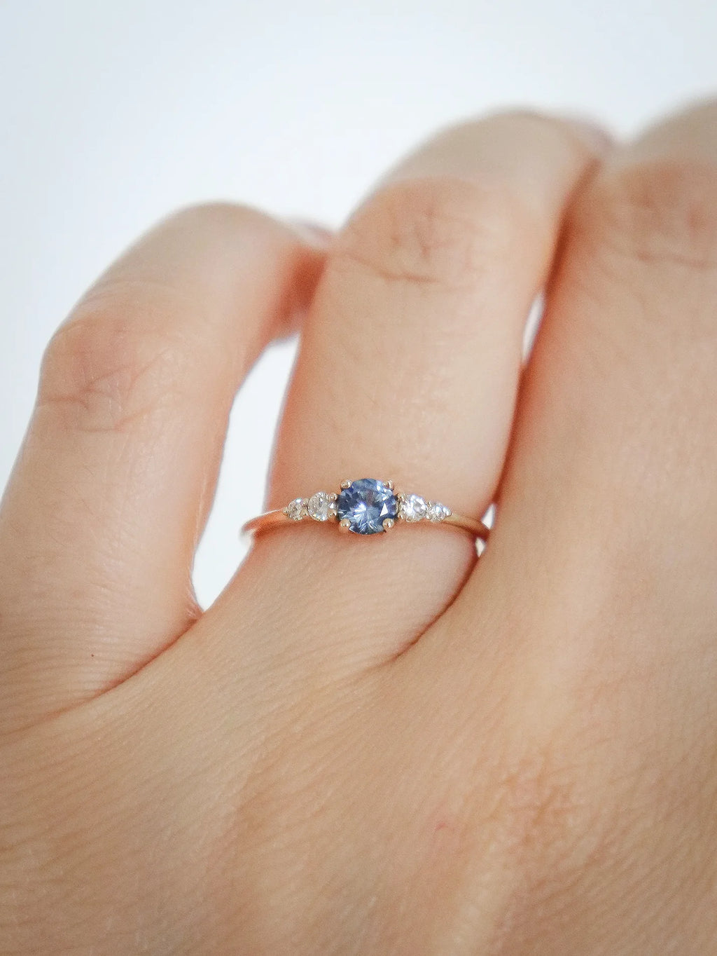 Frost sonnet. Light blue sapphire & diamonds