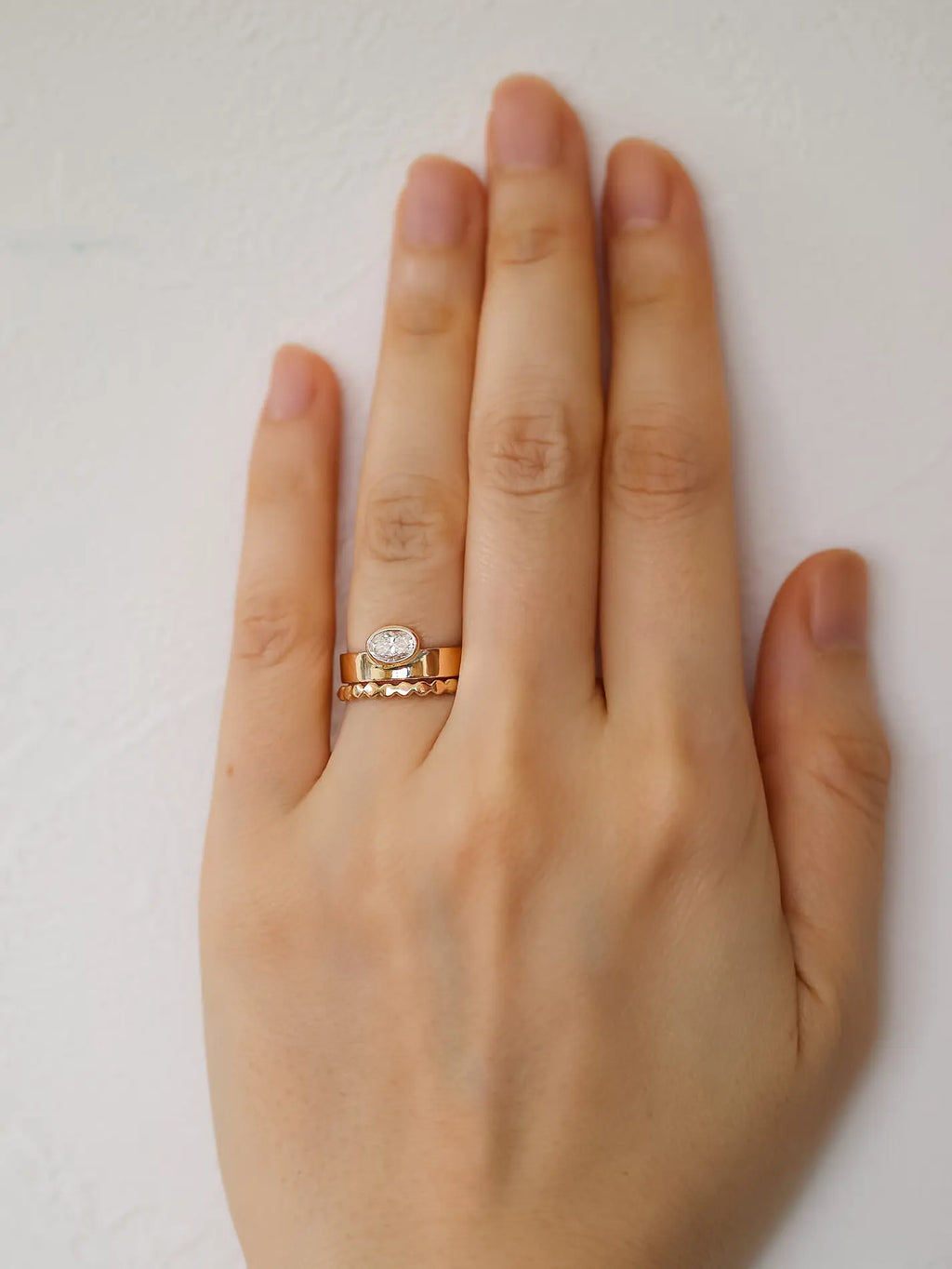 Gaia. Oval diamond bezel ring