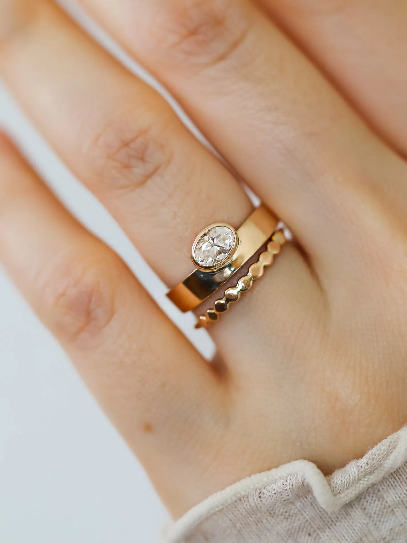 Gaia. Oval diamond bezel ring