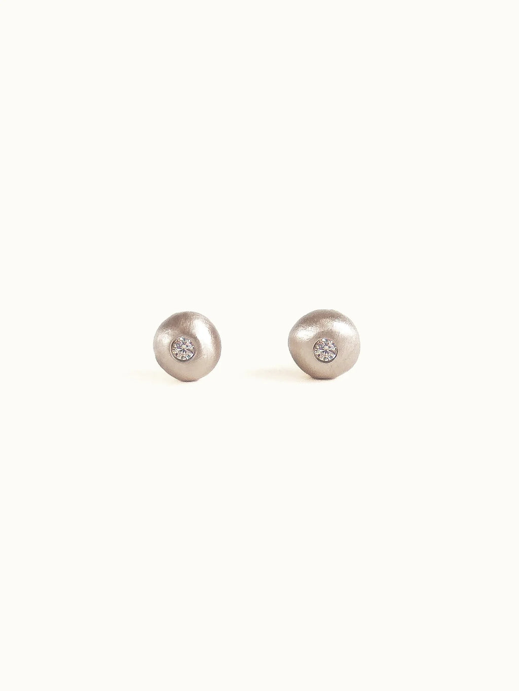 Pebble studs. White diamond