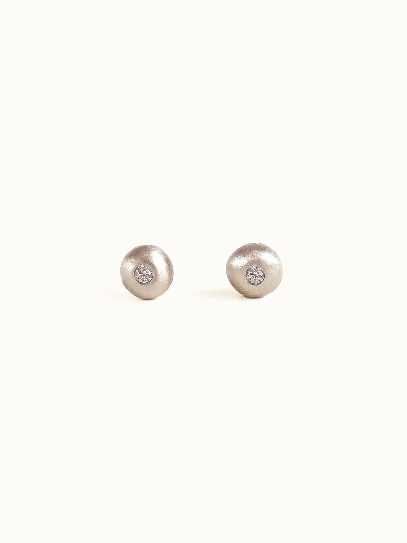 Pebble studs. White diamond