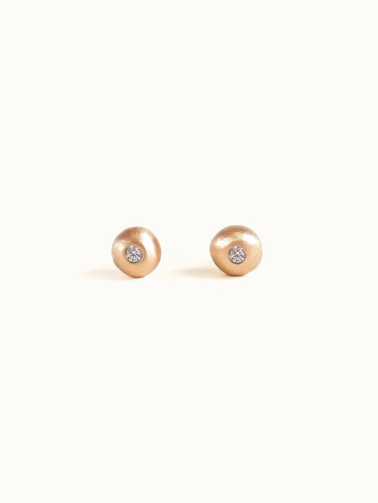 Pebble studs. White diamond