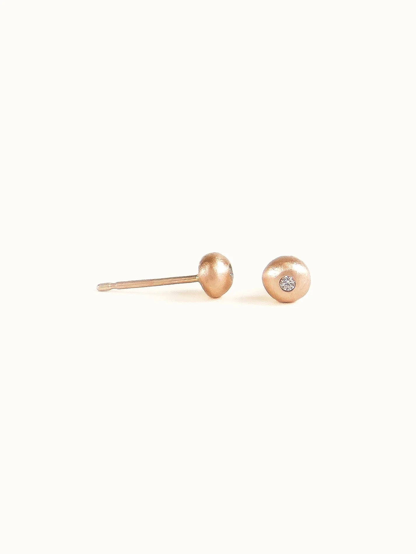 Pebble studs. White diamond