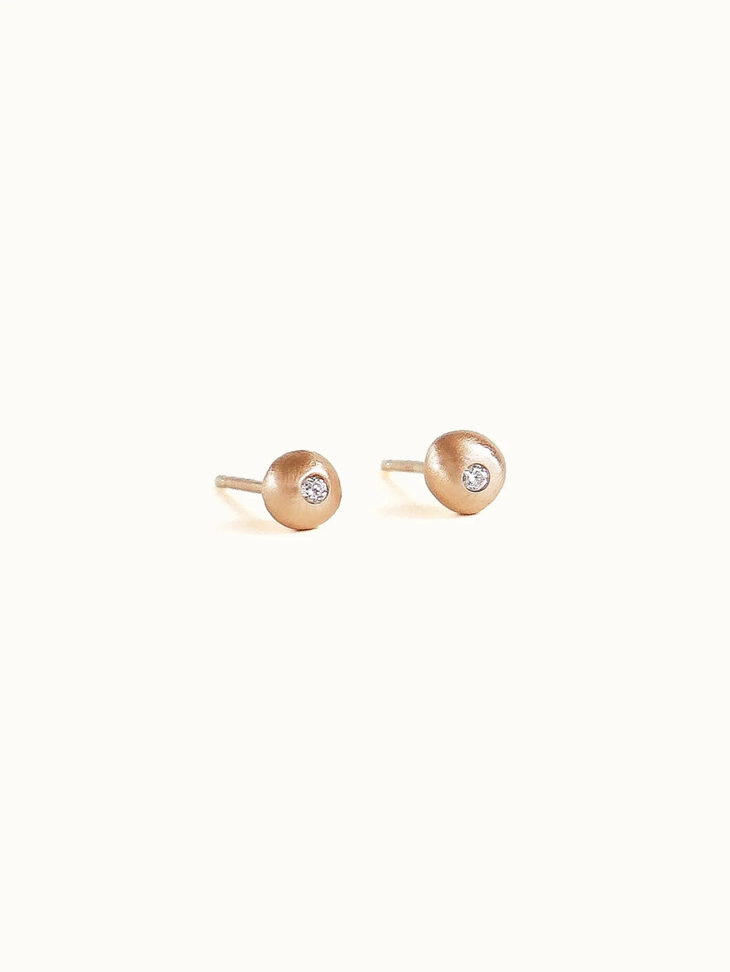 Pebble studs. White diamond