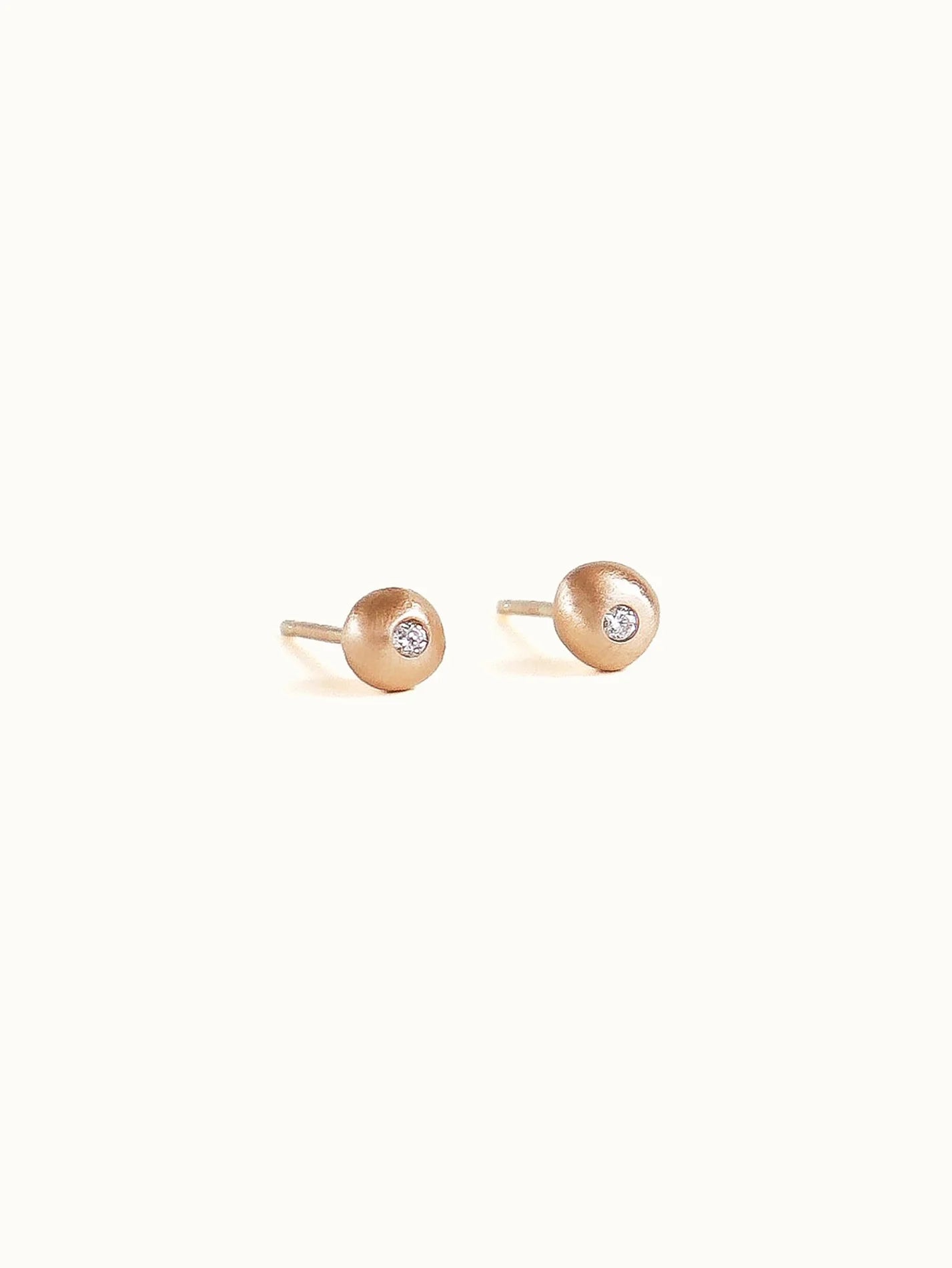 Pebble studs. White diamond