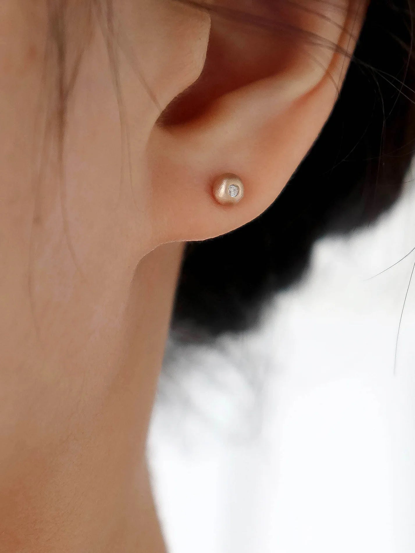 Pebble studs. White diamond
