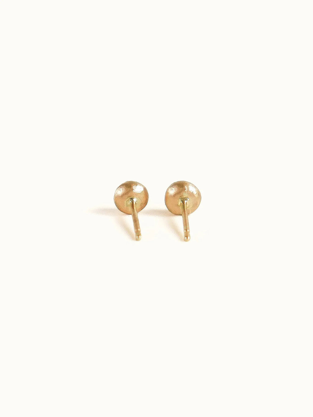 Pebble studs. White diamond