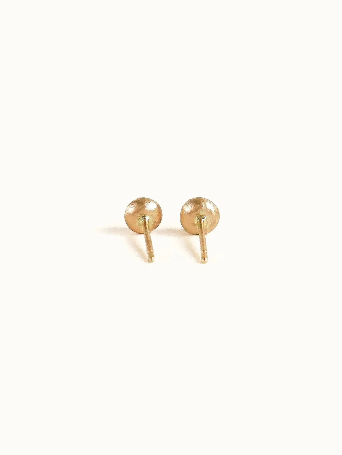 Pebble studs. White diamond