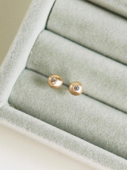 Pebble studs. White diamond