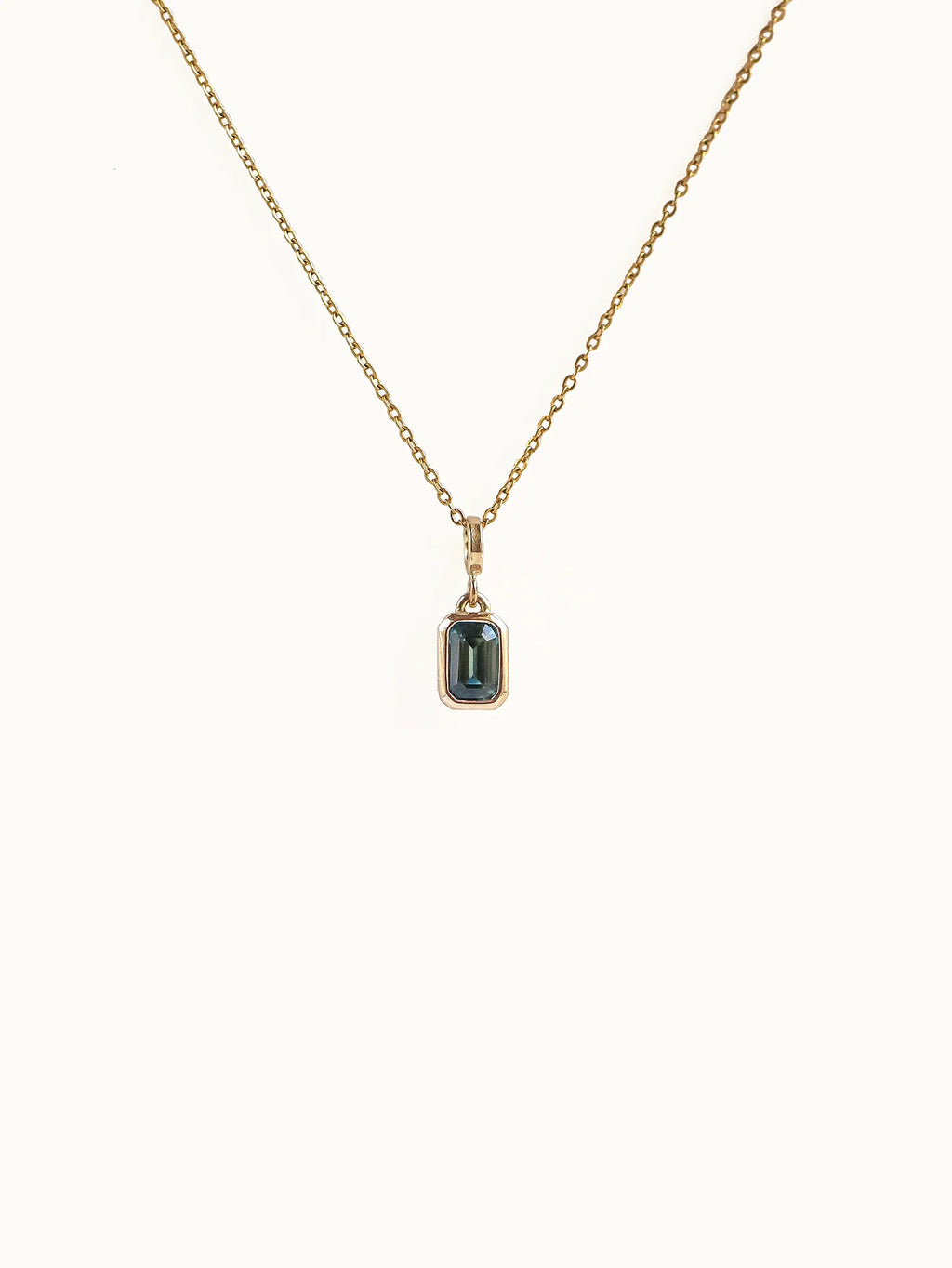 Rectangle step cut sapphire in Teal