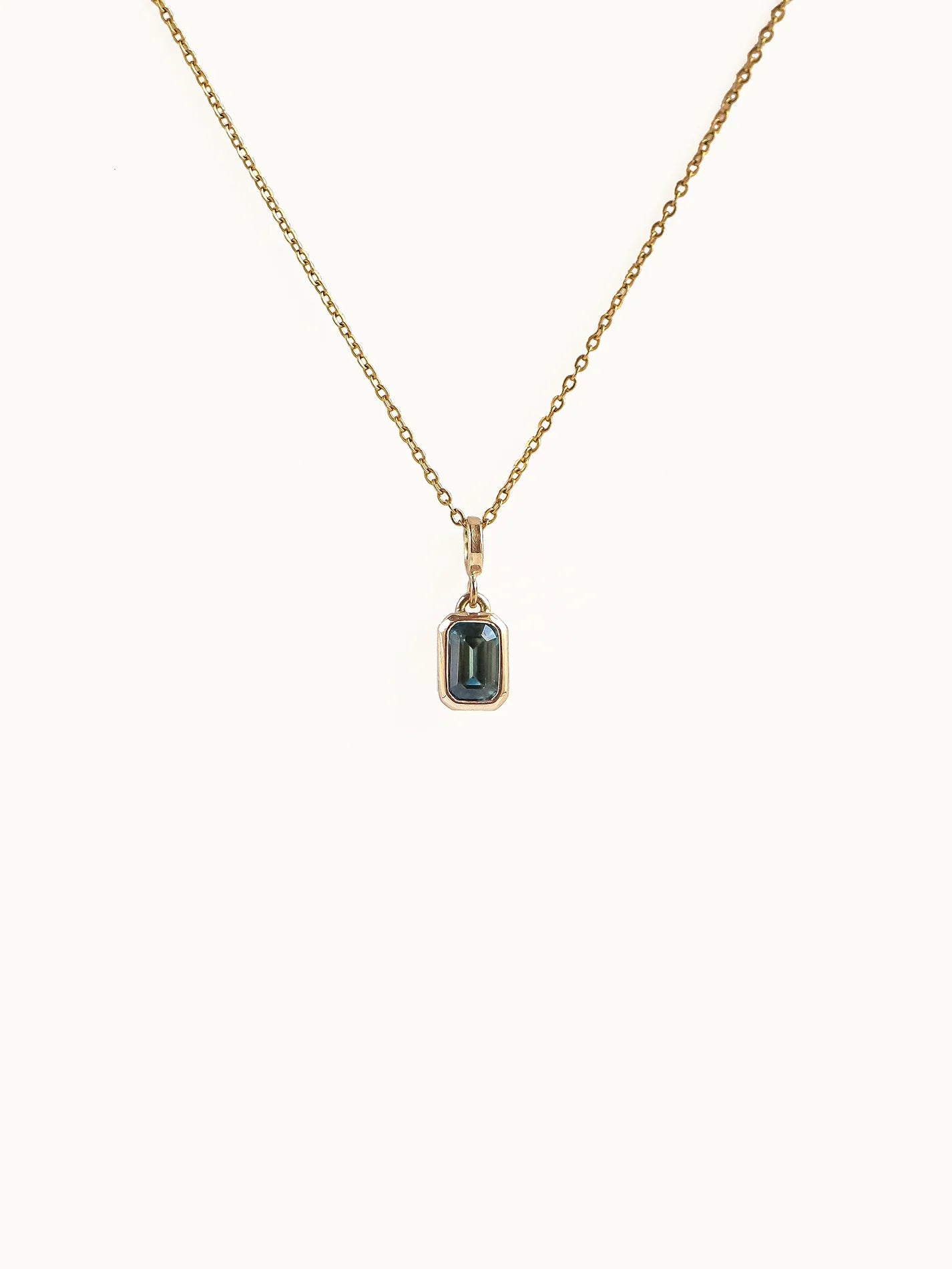 Rectangle step cut sapphire in Teal