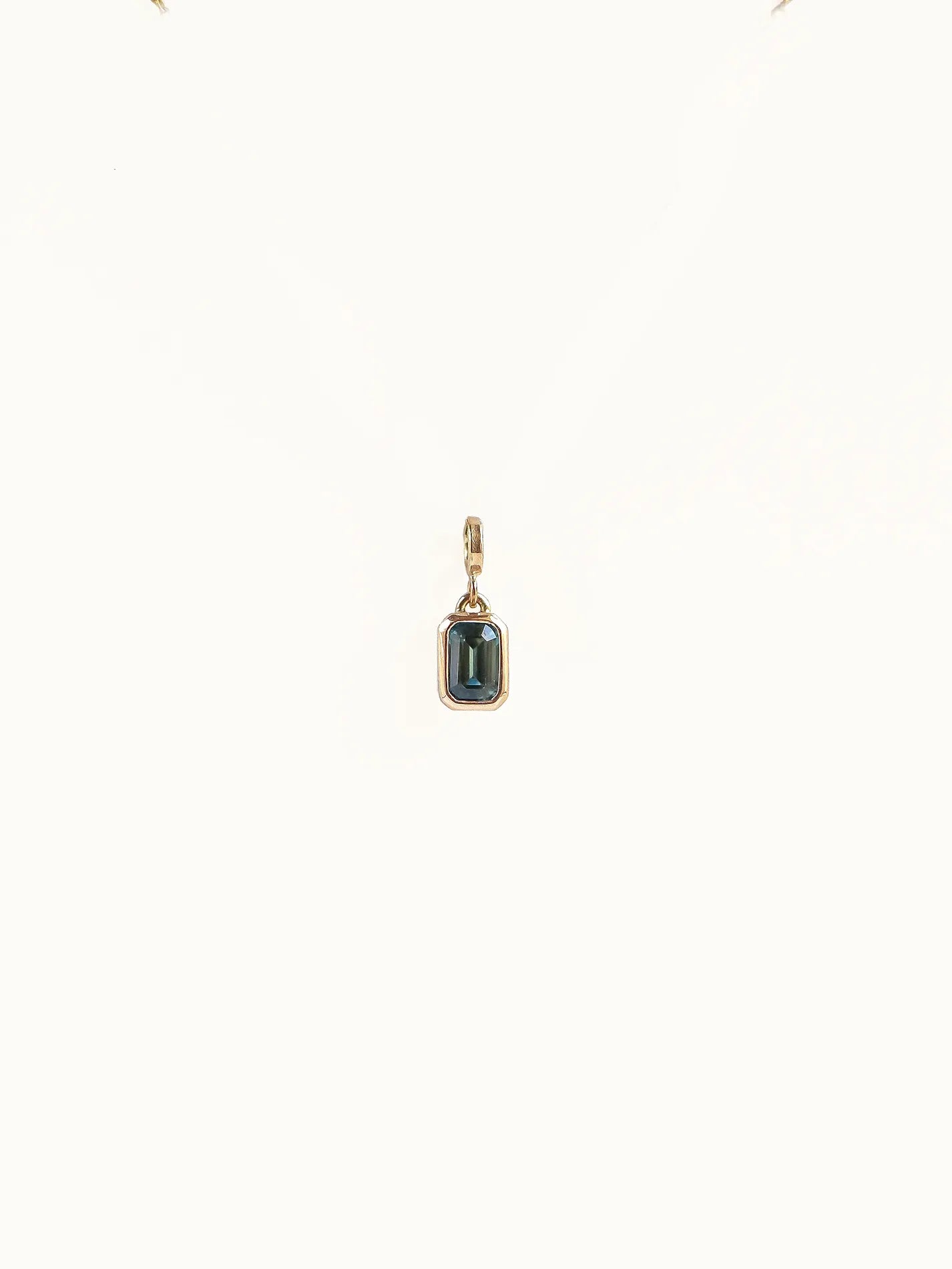 Rectangle step cut sapphire in Teal