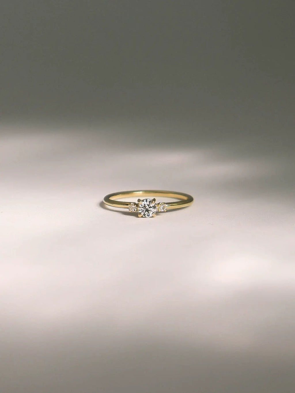 small trilogy diamond ring gold