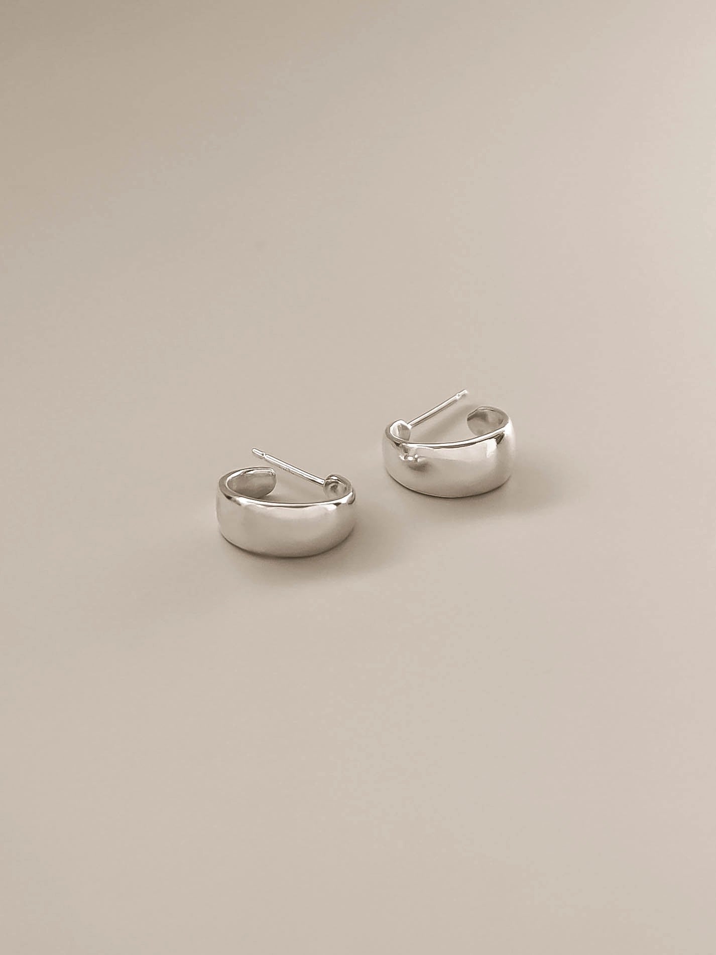 Silver Huggie hoop earrings