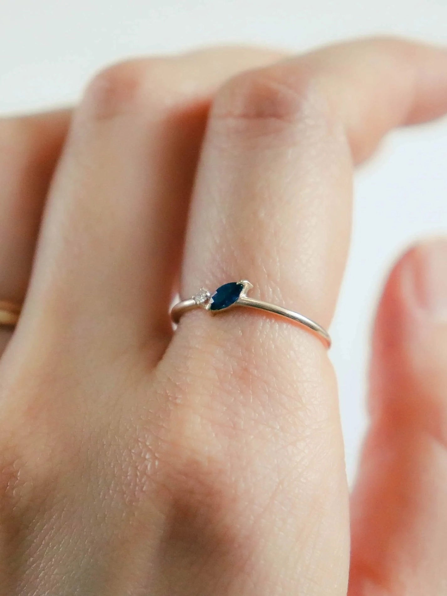 Petal ring. Blue marquise sapphire