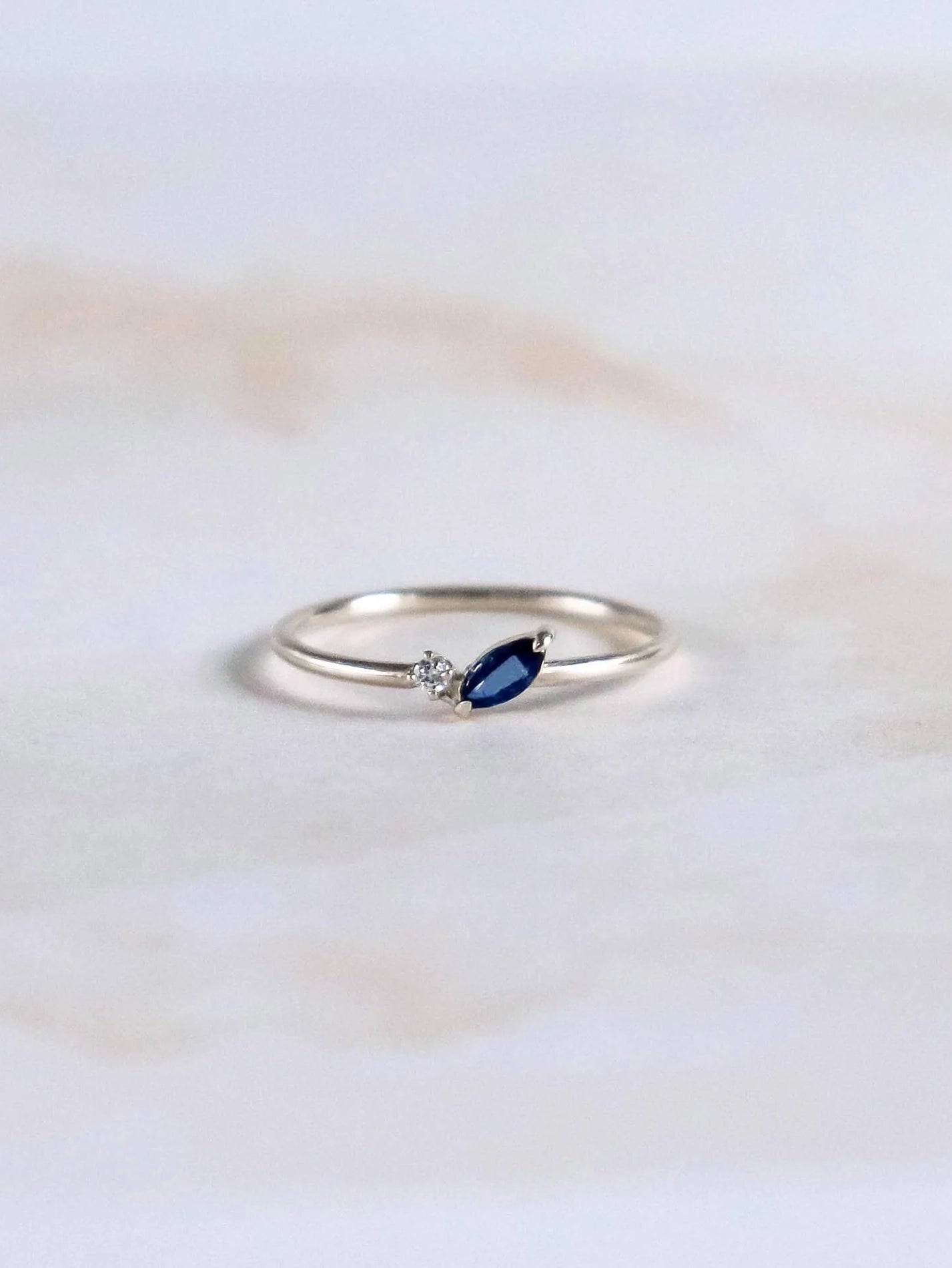 Petal ring. Blue marquise sapphire