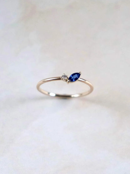 Petal ring. Blue marquise sapphire