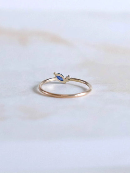 Petal ring. Blue marquise sapphire