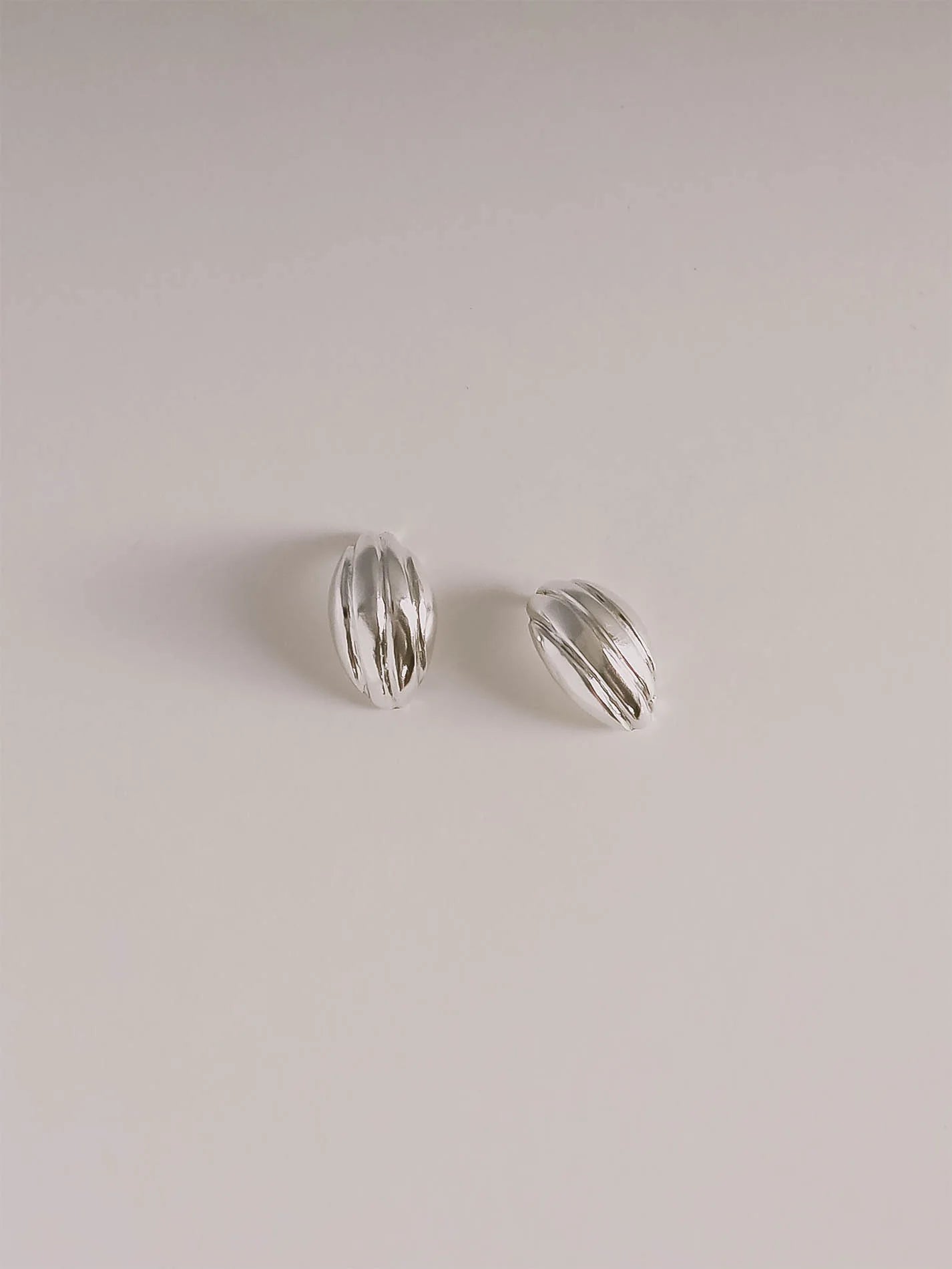 Silver dome huggie earrings