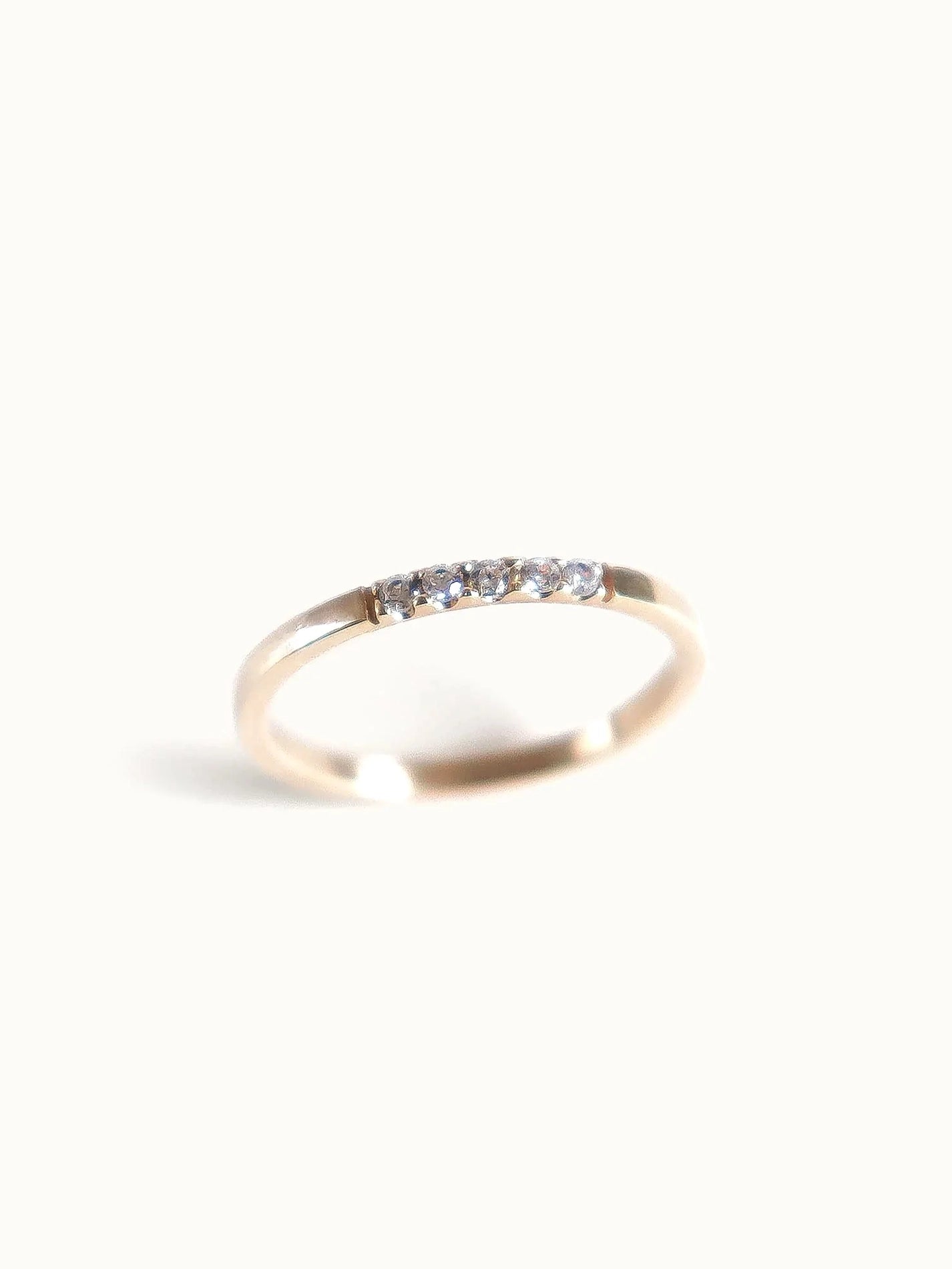 Vanee.  Petite pave diamond ring