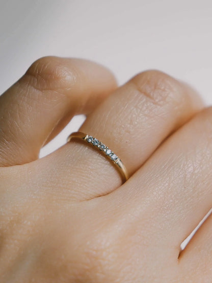 Vanee.  Petite pave diamond ring